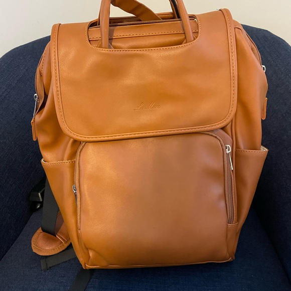 Diaper bag never used. Has soft leatherlook.( man made material) - Picture 2 of 8